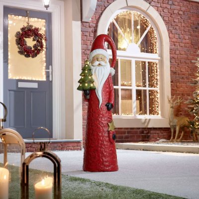 the-winter-workshop-102cm-round-red-santa-holding-green-tree-with-led-lights